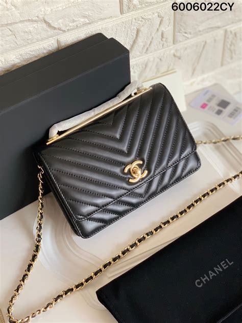 chanel classic clutch with chain vs woc